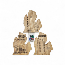 Load image into Gallery viewer, Wooden cribbage board with multiple games engraved on it against a white background