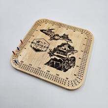 Load image into Gallery viewer, Wooden cribbage board with deer design and 'Michigan' text on a gray background
