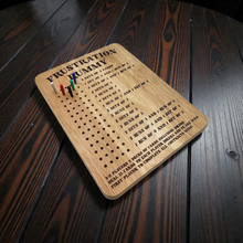 Load image into Gallery viewer, Frustration Rummy Wooden board game with text and pins on a wooden surface
